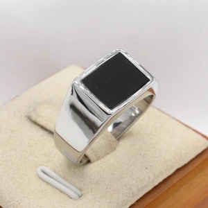 Minimalist men's silver titanium steel ring featuring a large rectangular black stone inlay