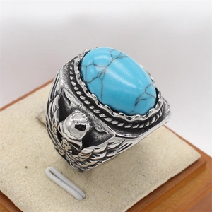 Retro stainless steel men's ring with turquoise gemstone and eagle head carvings