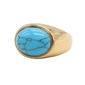 Macro view of oval sky blue stone with dark veins on a thick gold band ring