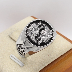 Retro Viking wolf head ring in titanium steel with Celtic knot relief details