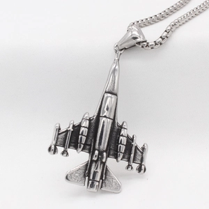 Vintage stainless steel fighter jet pendant necklace with retro finish on box chain