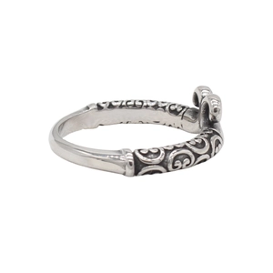 Retro stainless steel ring with vintage embossed patterns and polished silver finish