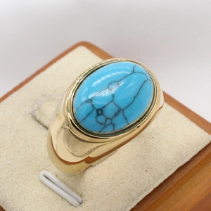 Minimalist gold plated stainless steel ring with large oval turquoise stone inlay