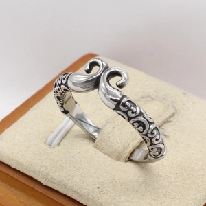 Retro stainless steel silver monkey king bar ring with intricate vintage carvings