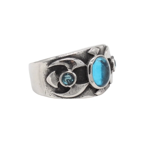 Vintage stainless steel ring featuring a large blue gemstone and antique silver finish