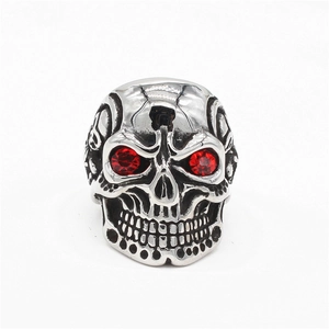 Retro stainless steel skull ring for men with red gemstone eyes and oxidized punk finish