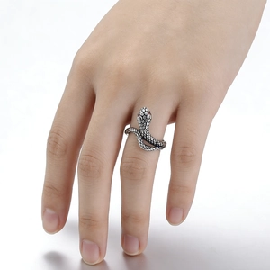 Vintage stainless steel snake ring with red zircon eyes and textured scales for men