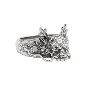 Retro dragon head ring in vintage silver finish with detailed dragon scale engraving