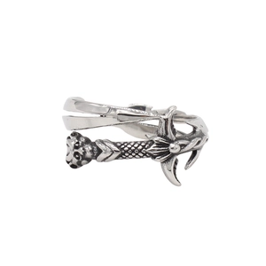 Detail of vintage sword ring featuring oxidized silver finish and gothic metal engraving