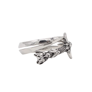 Close-up of vintage silver dragon sword ring with detailed scales and open band