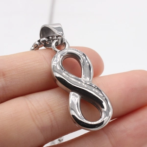 Polished silver infinity symbol pendant necklace in durable titanium stainless steel