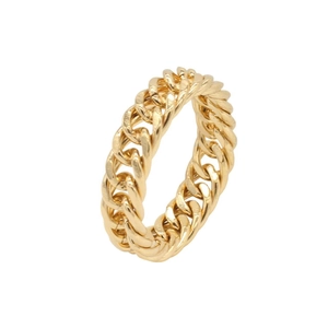 Macro detail of gold Cuban link chain ring with high-polished metallic finish