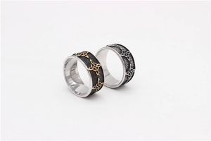 Detailed macro view of vintage Celtic knot rings in gold and silver finish