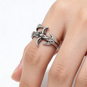 Retro gothic sword ring in silver-toned titanium steel with vintage embossed textures