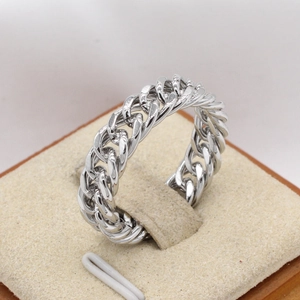 Mens silver Cuban link chain ring in minimalist stainless steel displayed in a jewelry box