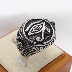Vintage stainless steel signet ring for men featuring an Egyptian Eye of Horus relief