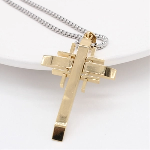 Modern minimalist gold cross pendant with layered geometry on a silver bead chain