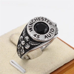 Vintage steel ring with .45 caliber bullet shell design and black faceted gemstone