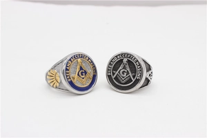 Macro detail of Freemason steel rings with Free and Accepted Masons engraving