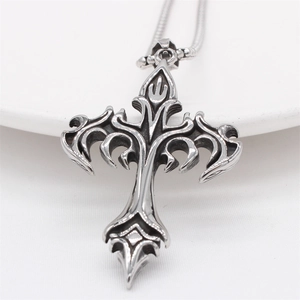 Gothic retro stainless steel cross necklace with intricate hollow carvings and snake chain