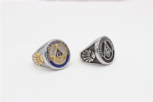 Detail of Freemasonry rings with Free and Accepted Masons engraving and iconic symbols