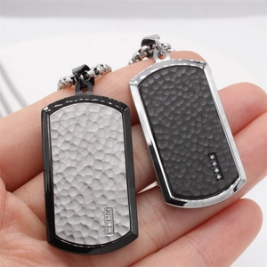 Mens dog tag necklace in black and silver steel with hammered texture and rhinestones