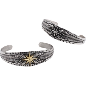Vintage retro feather cuff bracelet with star motif in silver and gold steel finish