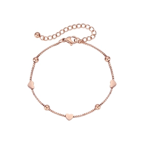 Detail of rose gold heart bracelet featuring box chain links and adjustable clasp