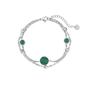 Detail view of a double-layer silver chain bracelet with peacock green malachite round charms