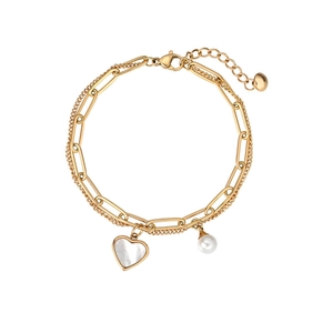 Detail of gold double-layer bracelet with heart mother of pearl and pearl charms