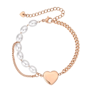 Minimalist rose gold heart bracelet with elegant white pearls and a classic cuban chain
