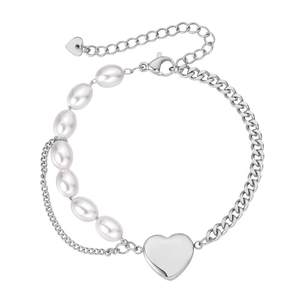 Minimalist pearl and cuban link chain bracelet with a polished silver heart pendant