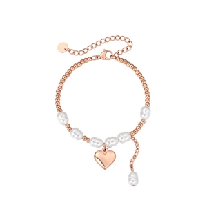 Détails du bracelet en or rose avec perles blanches et pendentif cœur sur fermoir mousqueton