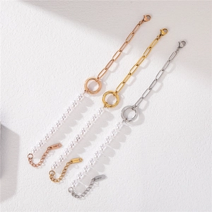 Three-tone paperclip chain bracelets with white pearls in gold silver and rose gold