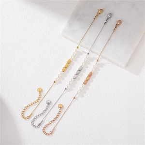 Elegantes Herzanhänger-Armband mit Süßwasserperlen in Gold, Silber und Roségold-Finish