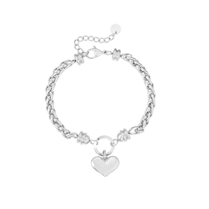 Detail of silver wheat chain bracelet with polished heart pendant and lobster clasp