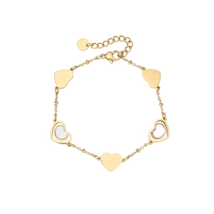 Macro detail of gold-plated heart bracelet with openwork design and adjustable clasp
