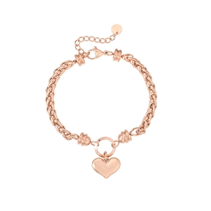 Detail of rose gold braided Cuban chain bracelet with 3D heart pendant and lobster clasp