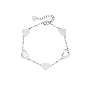 Detail of silver heart bracelet featuring polished and cutout charms with lobster clasp