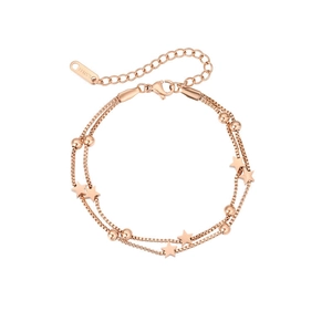 Detail of rose gold double-layer titanium steel bracelet with stars and lobster clasp