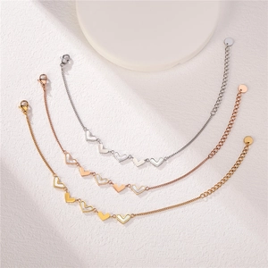Women's heart-shaped titanium steel bracelets in silver, rose gold, and gold finishes