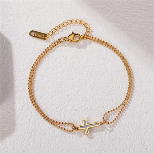 Bracelet minimaliste en acier titane doré à double chaîne avec pendentif croix en nacre
