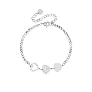 Detail of silver heart charm bracelet showing pave crystals and polished hollow pendants