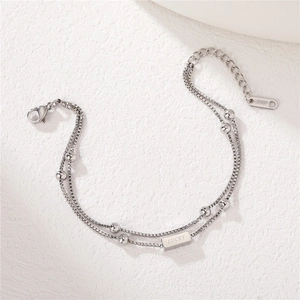Double-layered silver titanium steel bracelet with Lucky bar and small beads