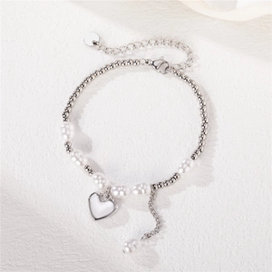 Bracelet élégant en perles d'argent avec perles irrégulières et breloque en forme de cœur