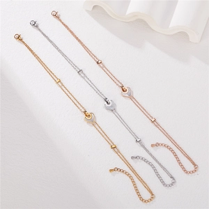 Bracelets double chaîne en acier avec pendentif cœur en nacre dorés et argentés