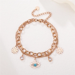 Bracelet multicouche gourmette or rose avec pendentifs œil et fleur pour femme