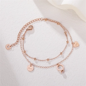 Elegant rose gold double-layer titanium steel bracelet with heart and ring charms