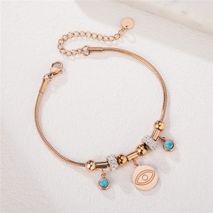 Bracelet à chaîne serpent or rose avec perles turquoise et pendentif mauvais œil