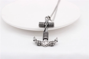 Detailed view of retro stainless steel anchor pendant with intricate rope texture details